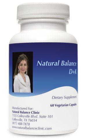 A bottle of natural balance d + k supplement